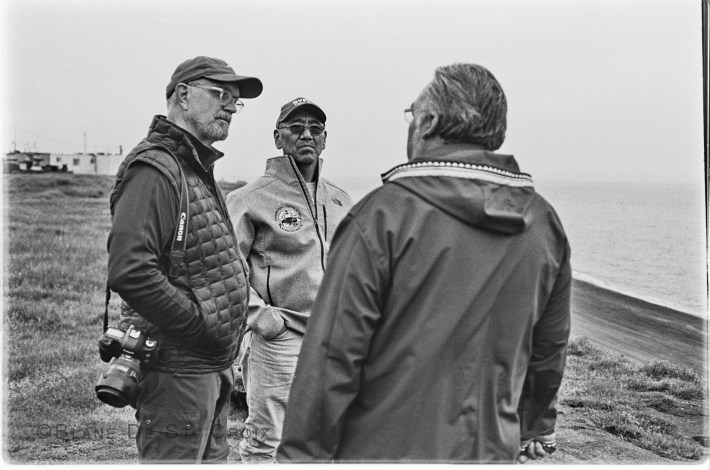 Artist with Inupiaq tribal leaders Herman Ahsoak and Ned Arey, overlooking the Arctic Ocean Utqiagvik AK, photo Paul DeLuna