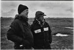 Blane De St. Croix with Climate Scientist Craig Tweedie looking across the Arctic’s Permafrost, Utqiagvik, AK, photo. Paul DeLuna